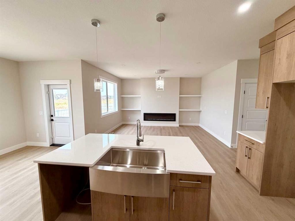 534 Ranch Green, Strathmore, AB - Indoor Photo Showing Kitchen With Double Sink