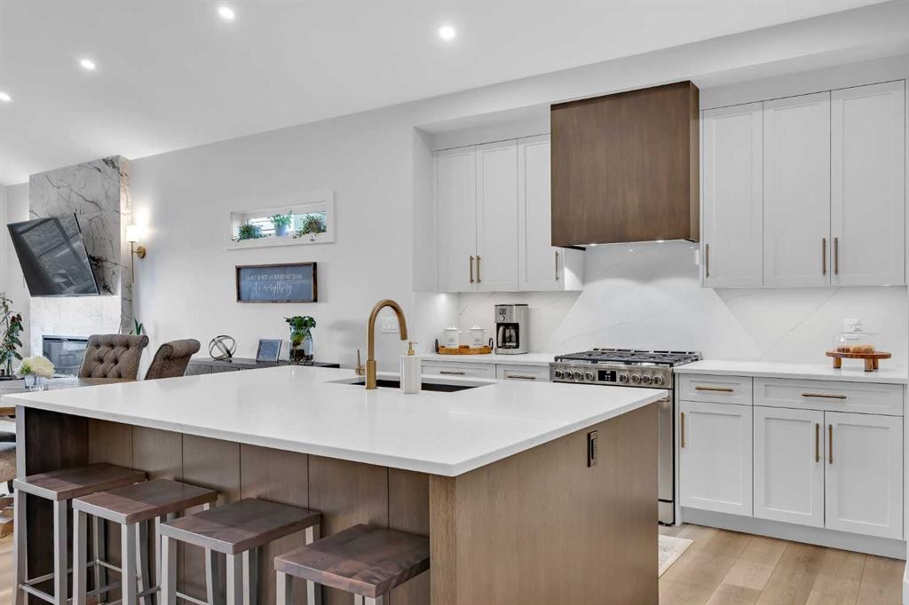 13 Emerson Crescent, Okotoks, AB - Indoor Photo Showing Kitchen With Upgraded Kitchen