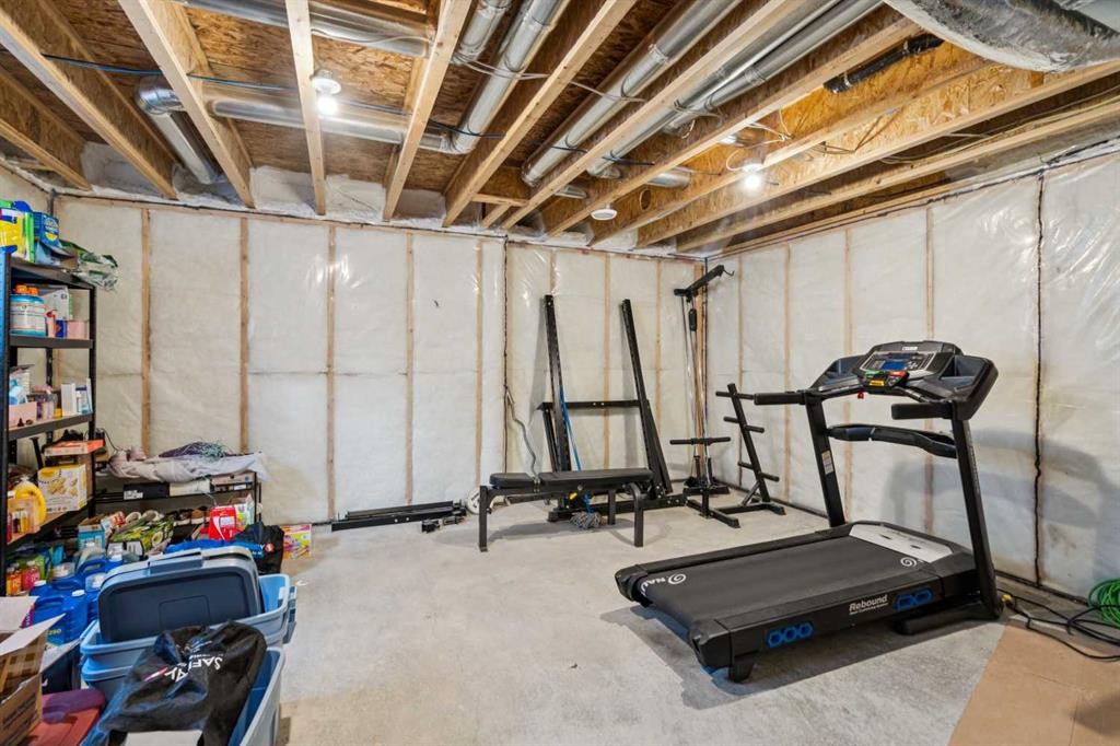 101-24 Rivercrest Drive, Cochrane, AB - Indoor Photo Showing Basement
