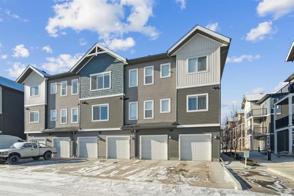 903-24 Rivercrest Drive, Cochrane, AB - Outdoor With Facade