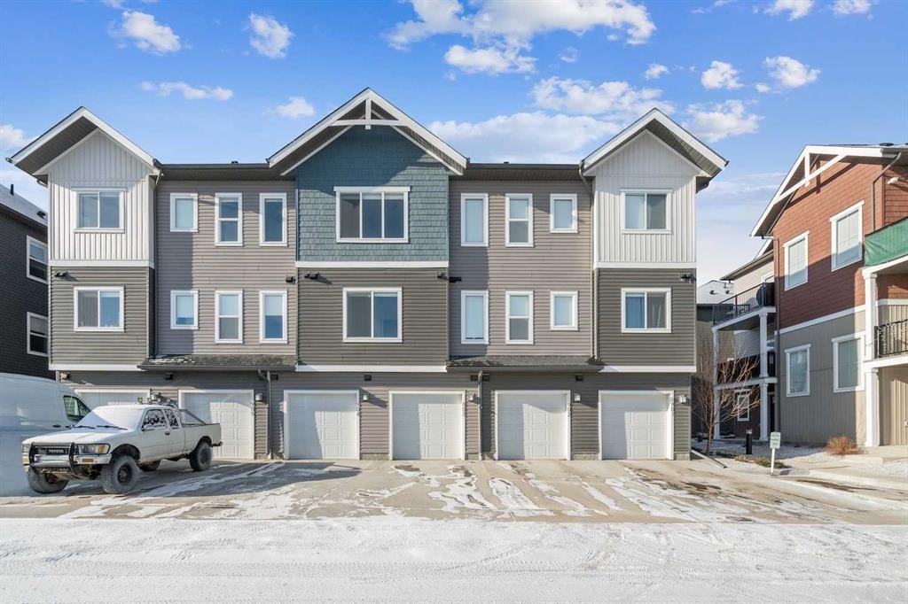 903-24 Rivercrest Drive, Cochrane, AB - Outdoor With Facade