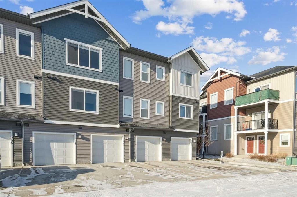 903-24 Rivercrest Drive, Cochrane, AB - Outdoor With Facade