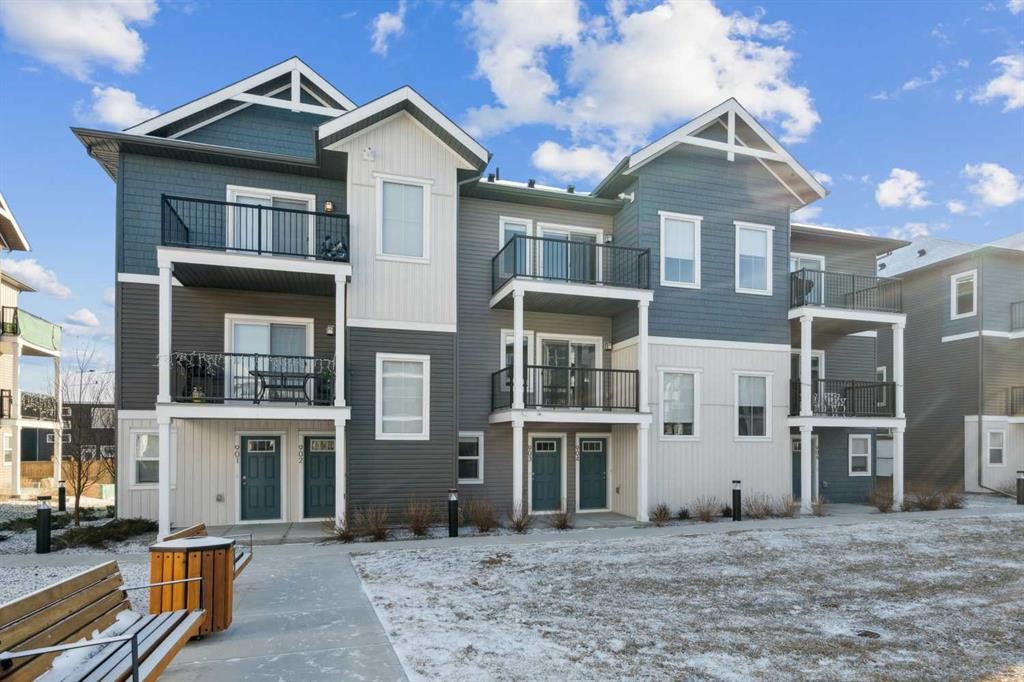 903-24 Rivercrest Drive, Cochrane, AB - Outdoor With Facade