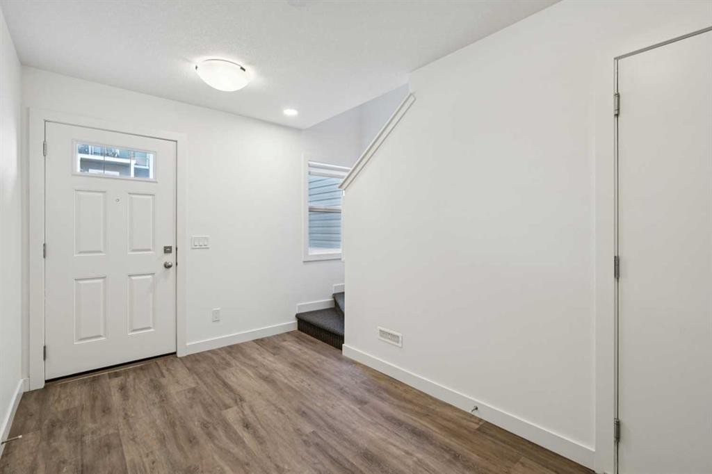 903-24 Rivercrest Drive, Cochrane, AB - Indoor Photo Showing Other Room