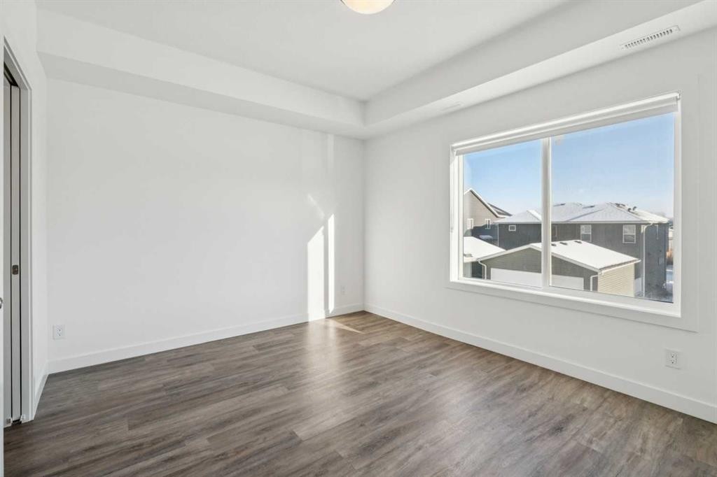 903-24 Rivercrest Drive, Cochrane, AB - Indoor Photo Showing Other Room