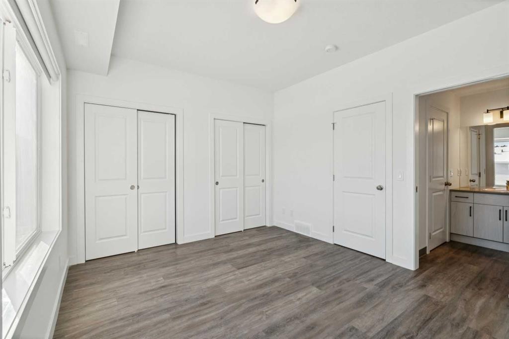 903-24 Rivercrest Drive, Cochrane, AB - Indoor Photo Showing Other Room