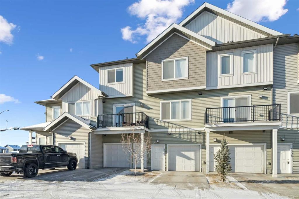 1502-24 Rivercrest Drive, Cochrane, AB - Outdoor With Facade