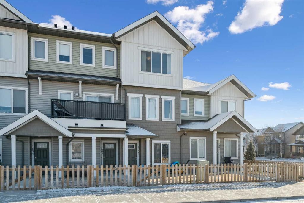 1502-24 Rivercrest Drive, Cochrane, AB - Outdoor With Facade
