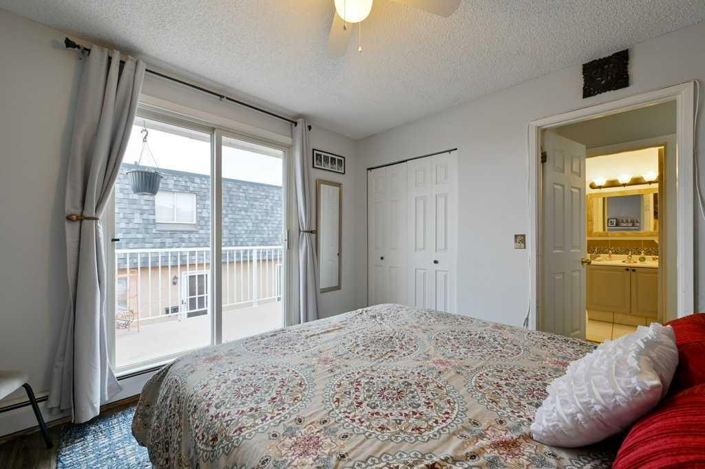 5-7740 Hunterview Drive Nw, Calgary, AB - Indoor Photo Showing Bedroom