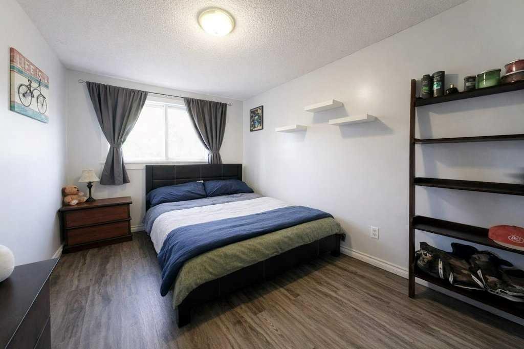 5-7740 Hunterview Drive Nw, Calgary, AB - Indoor Photo Showing Bedroom