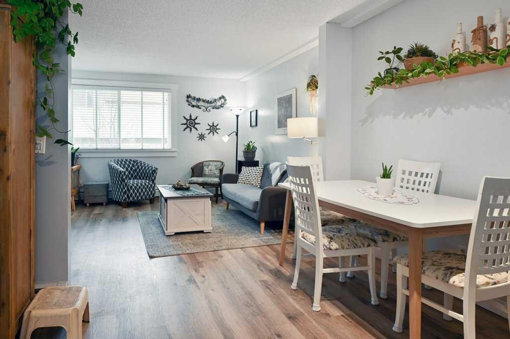 5-7740 Hunterview Drive Nw, Calgary, AB - Indoor Photo Showing Living Room