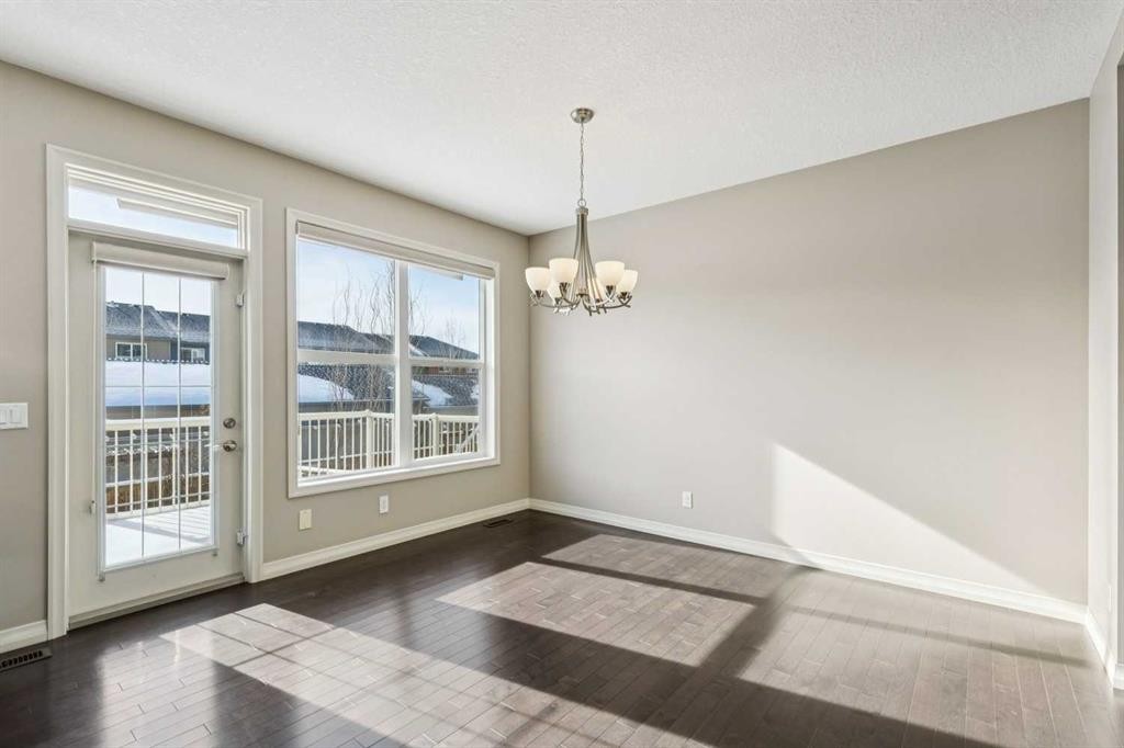 33 Sundown Grove, Cochrane, AB - Indoor Photo Showing Other Room