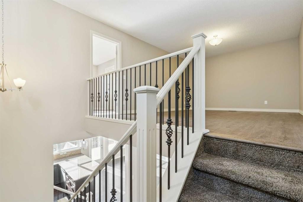 33 Sundown Grove, Cochrane, AB - Indoor Photo Showing Other Room