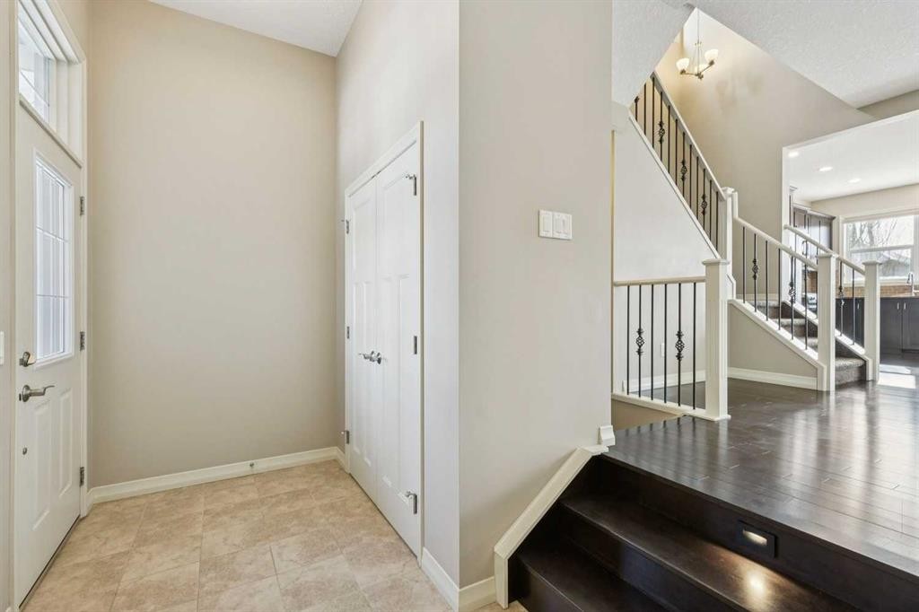 33 Sundown Grove, Cochrane, AB - Indoor Photo Showing Other Room