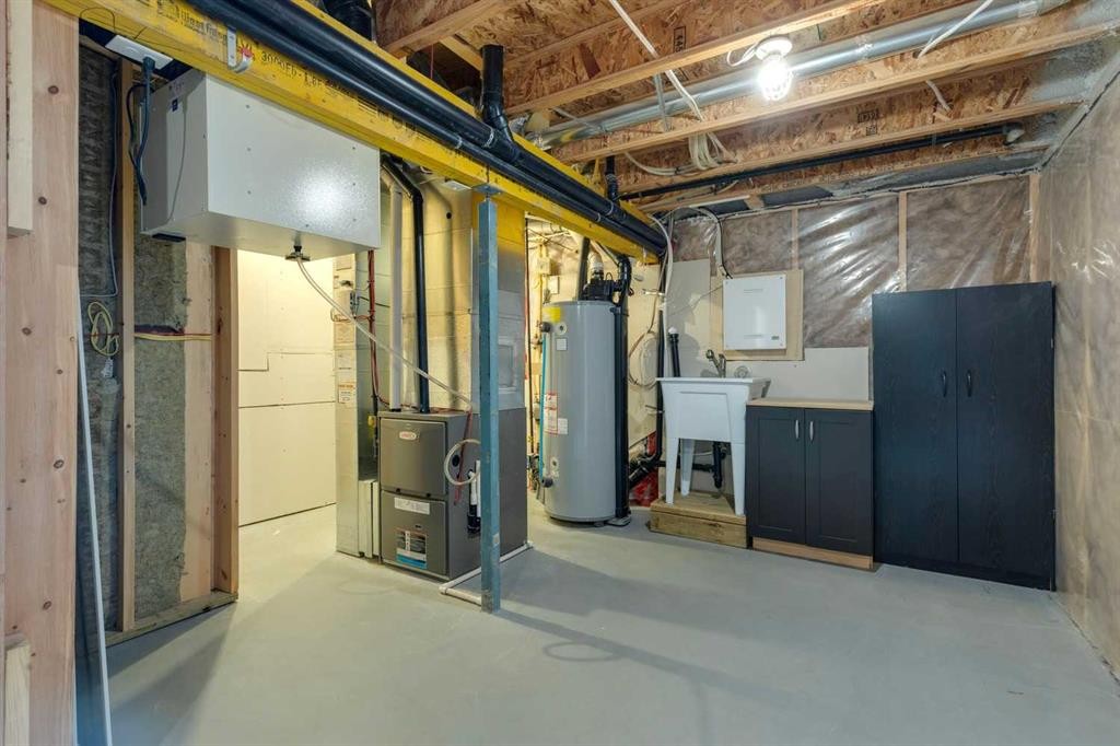 33 Sundown Grove, Cochrane, AB - Indoor Photo Showing Basement