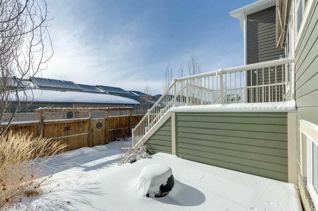 33 Sundown Grove, Cochrane, AB - Outdoor With Exterior