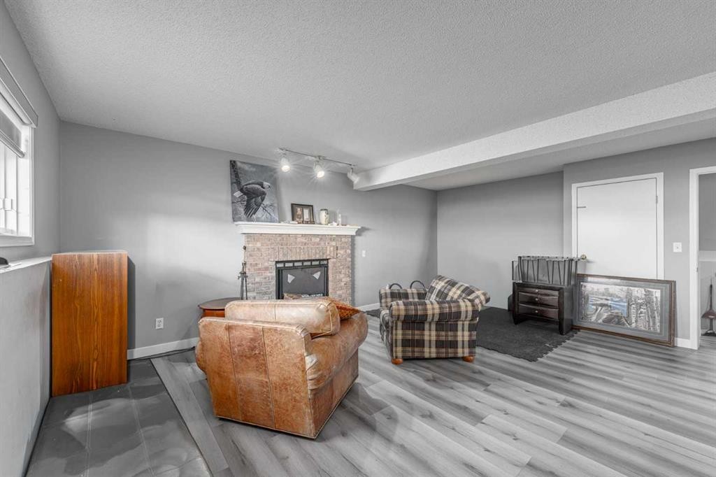 14 Coral Sands Place Ne, Calgary, AB - Indoor With Fireplace