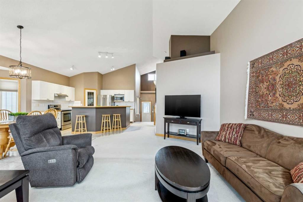 232 Springmere Place, Chestermere, AB - Indoor Photo Showing Living Room