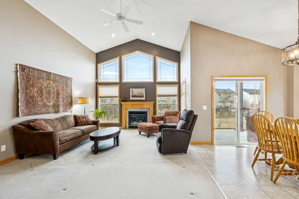 232 Springmere Place, Chestermere, AB - Indoor Photo Showing Living Room With Fireplace