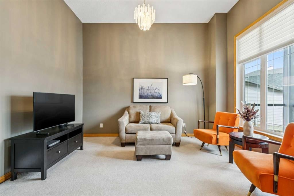 232 Springmere Place, Chestermere, AB - Indoor Photo Showing Living Room