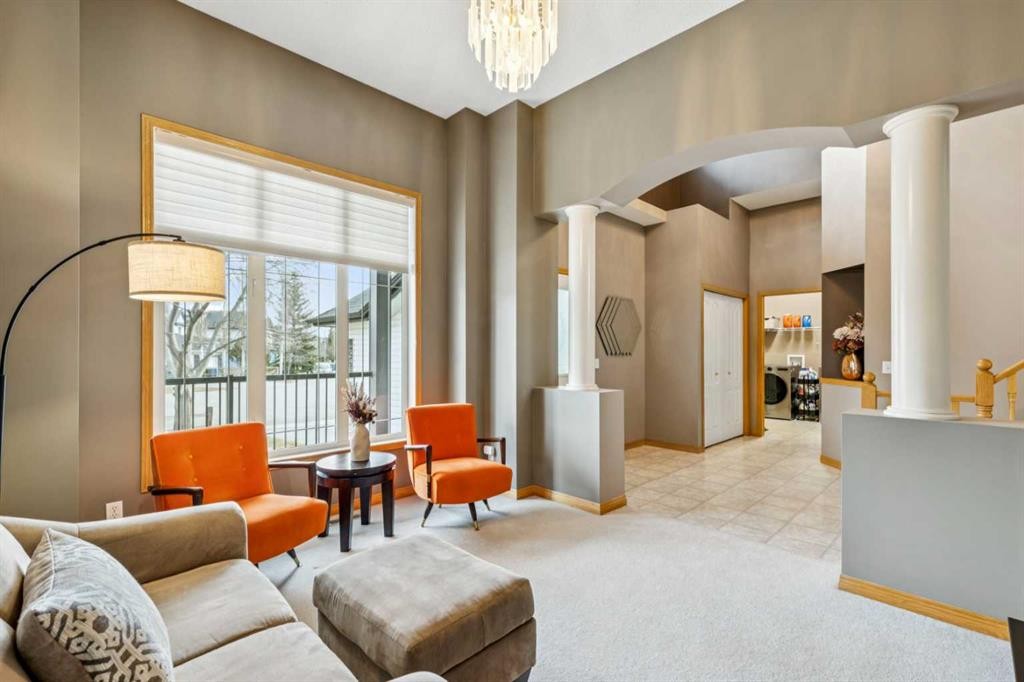 232 Springmere Place, Chestermere, AB - Indoor Photo Showing Living Room