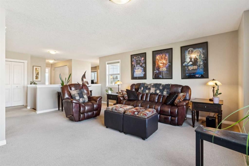 645 Panatella Boulevard Nw, Calgary, AB - Indoor Photo Showing Living Room