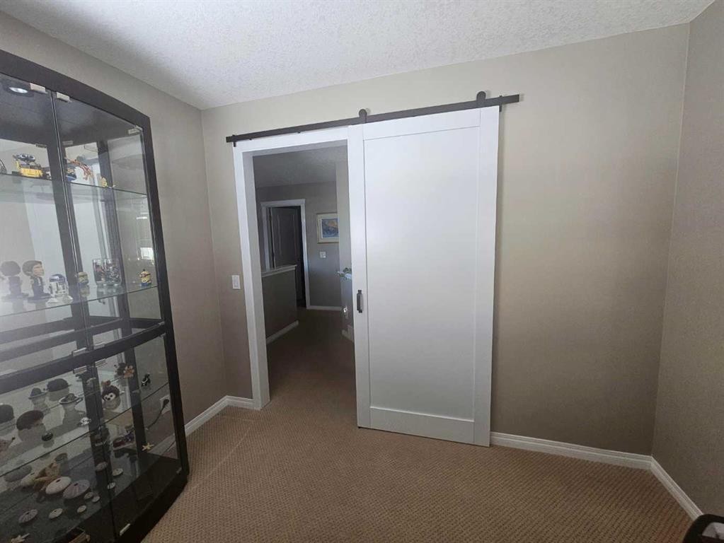645 Panatella Boulevard Nw, Calgary, AB - Indoor Photo Showing Other Room