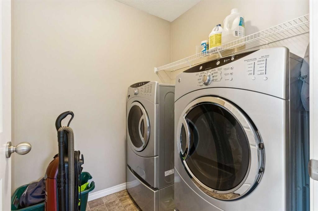 645 Panatella Boulevard Nw, Calgary, AB - Indoor Photo Showing Laundry Room