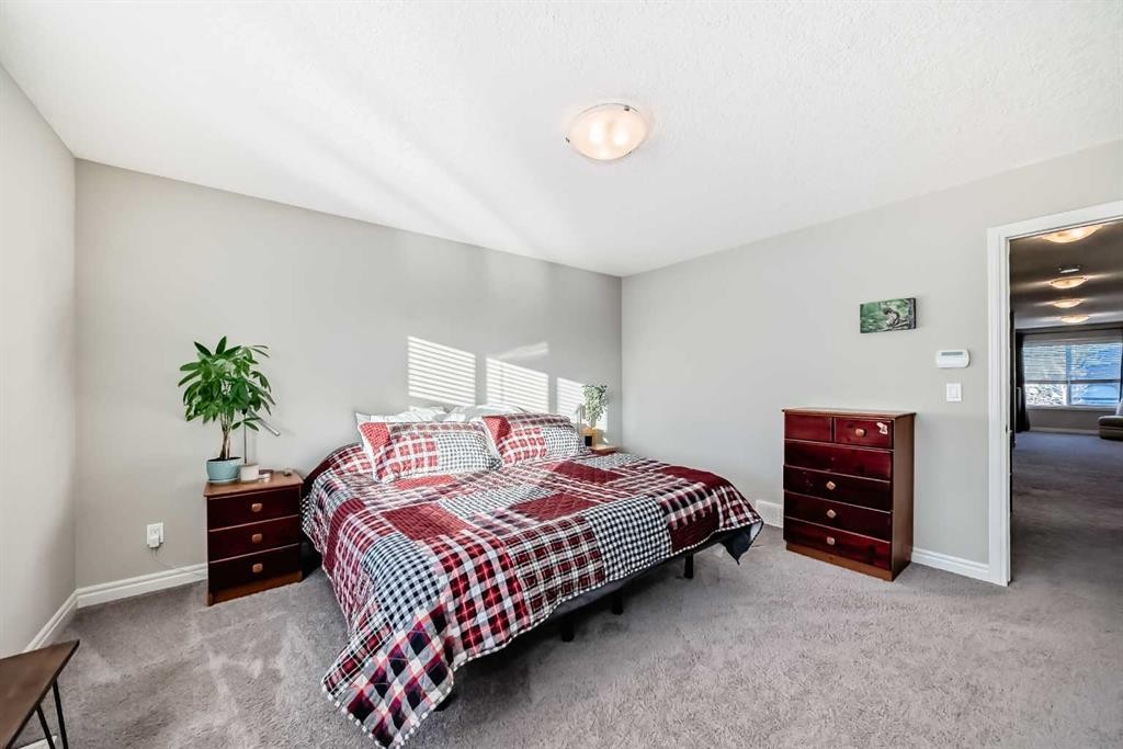 57 Silverado Skies Way Sw, Calgary, AB - Indoor Photo Showing Bedroom