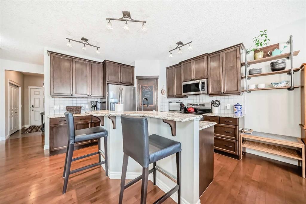 57 Silverado Skies Way Sw, Calgary, AB - Indoor Photo Showing Kitchen With Stainless Steel Kitchen With Upgraded Kitchen