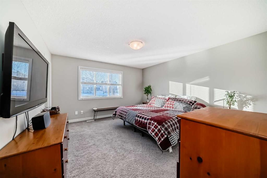 57 Silverado Skies Way Sw, Calgary, AB - Indoor Photo Showing Bedroom
