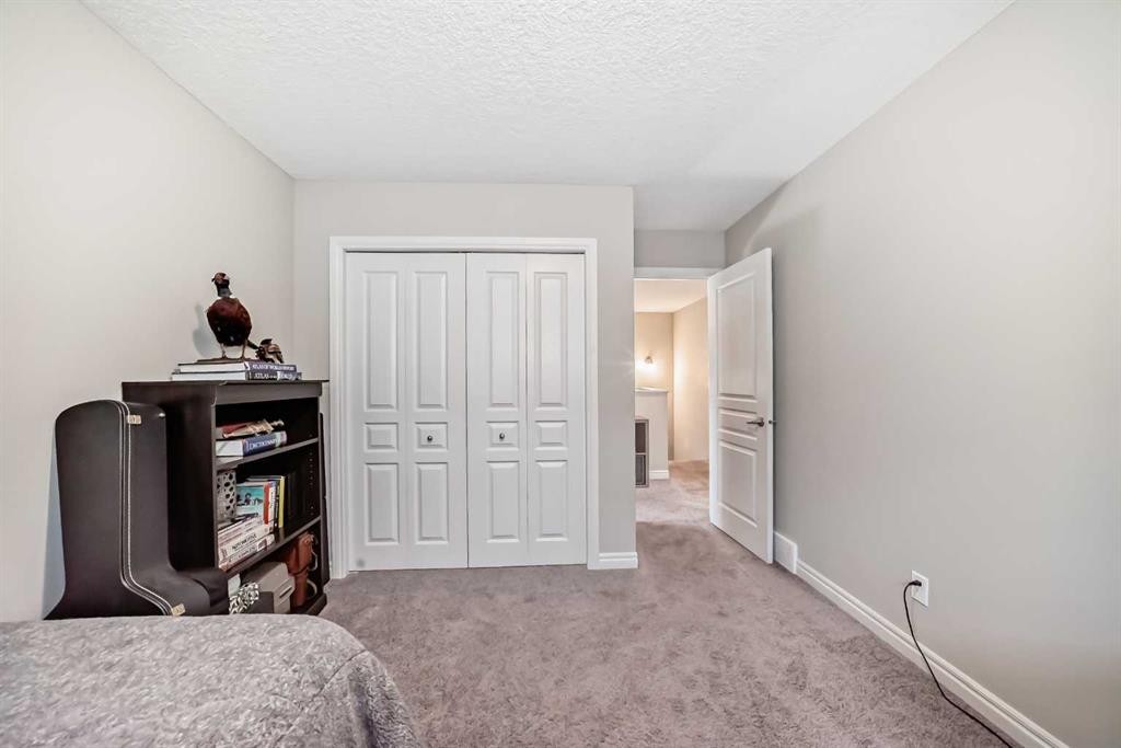 57 Silverado Skies Way Sw, Calgary, AB - Indoor Photo Showing Bedroom