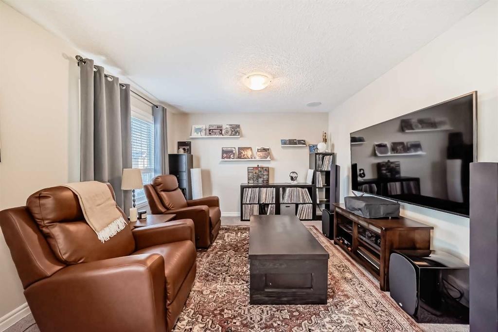 57 Silverado Skies Way Sw, Calgary, AB - Indoor Photo Showing Living Room