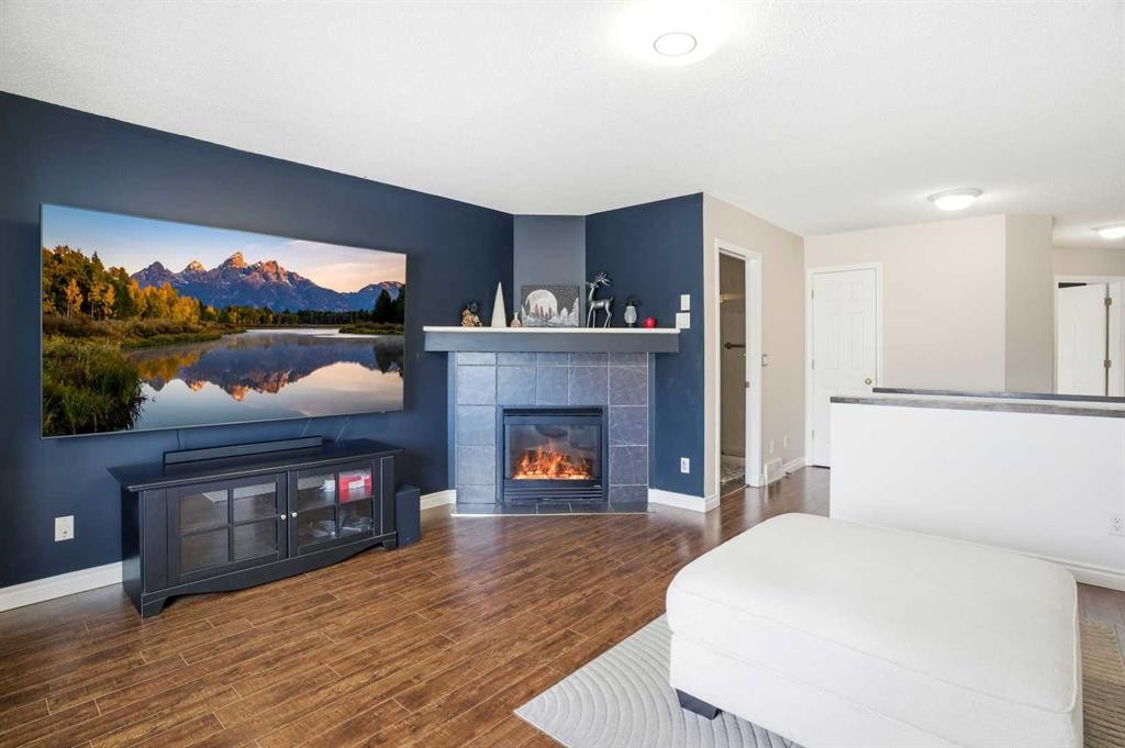 618 Citadel Drive Nw, Calgary, AB - Indoor Photo Showing Living Room With Fireplace