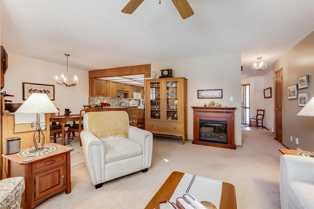 4118 Silverpark Estates Close, Olds, AB - Indoor Photo Showing Living Room With Fireplace