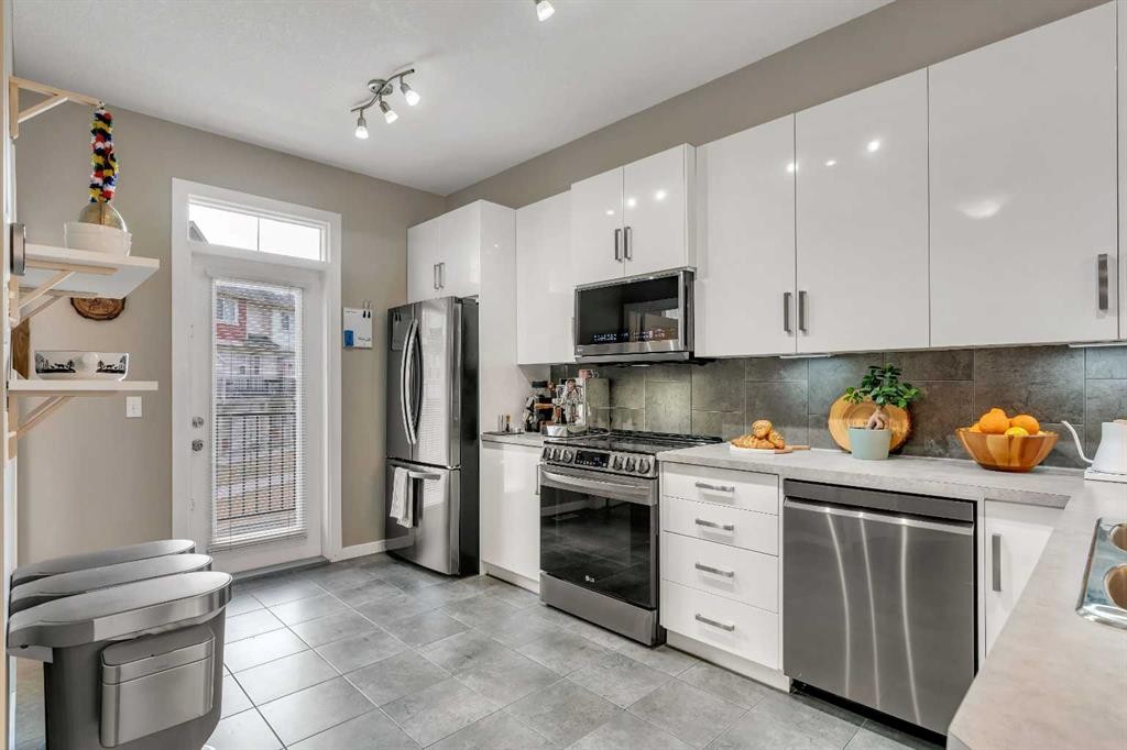 221 New Brighton Row Se, Calgary, AB - Indoor Photo Showing Kitchen With Stainless Steel Kitchen With Upgraded Kitchen