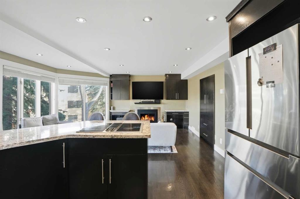 311 Coach Light Bay Sw, Calgary, AB - Indoor With Fireplace