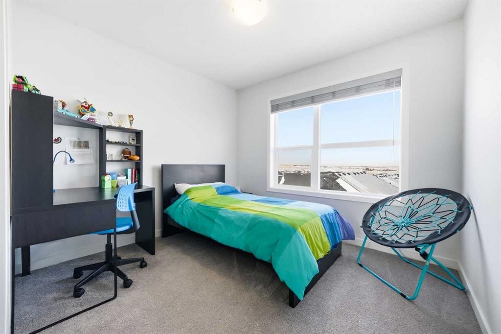 66 Evanscrest Manor Nw, Calgary, AB - Indoor Photo Showing Bedroom