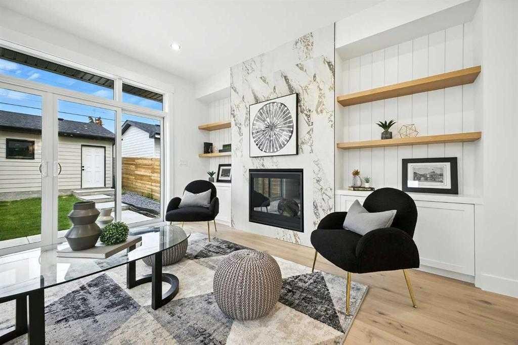 926 21 Avenue Nw, Calgary, AB - Indoor Photo Showing Living Room With Fireplace