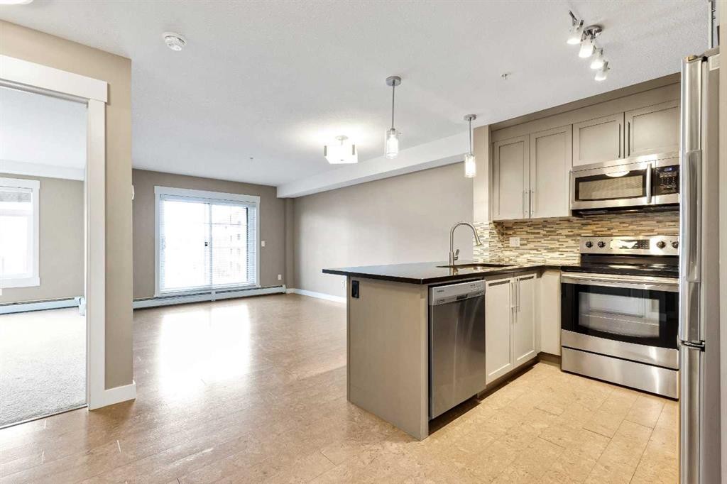 1302-155 Skyview Ranch Way Ne, Calgary, AB - Indoor Photo Showing Kitchen With Stainless Steel Kitchen With Upgraded Kitchen