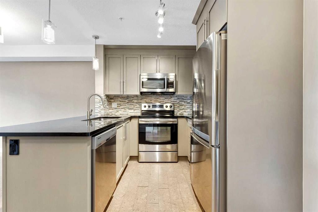 1302-155 Skyview Ranch Way Ne, Calgary, AB - Indoor Photo Showing Kitchen With Stainless Steel Kitchen With Upgraded Kitchen