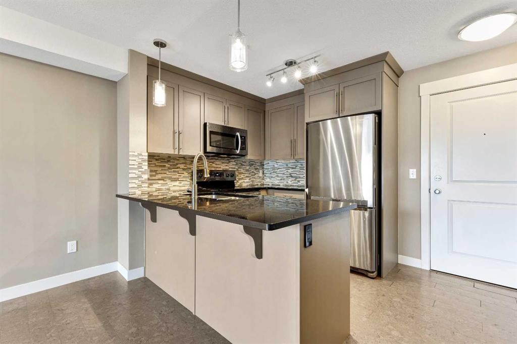 1302-155 Skyview Ranch Way Ne, Calgary, AB - Indoor Photo Showing Kitchen With Stainless Steel Kitchen With Upgraded Kitchen