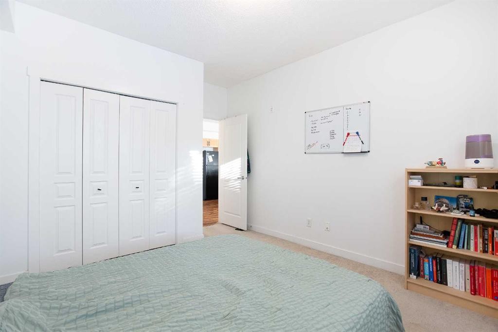 1116-211 Aspen Stone Boulevard Sw, Calgary, AB - Indoor Photo Showing Bedroom