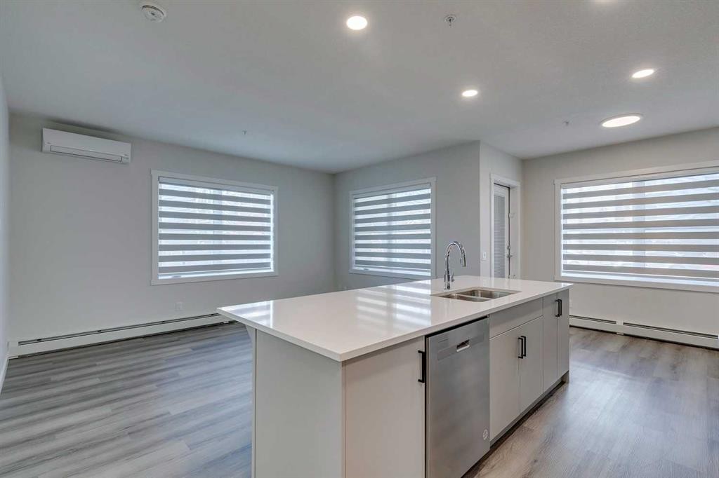 113-55 Wolf Hollow Crescent Se, Calgary, AB - Indoor Photo Showing Kitchen With Double Sink