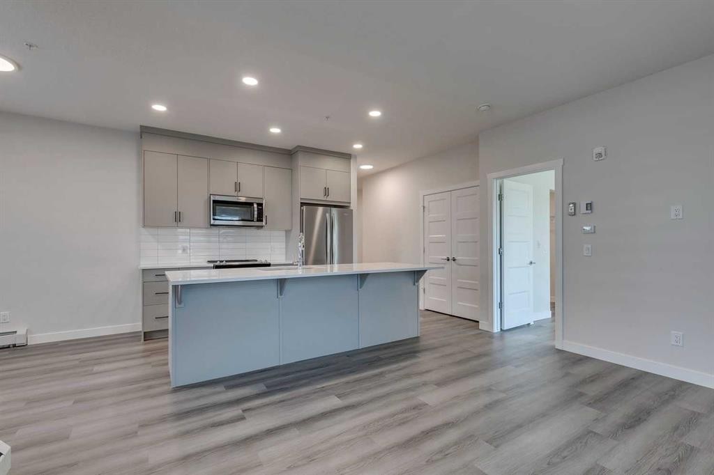 113-55 Wolf Hollow Crescent Se, Calgary, AB - Indoor Photo Showing Kitchen With Upgraded Kitchen