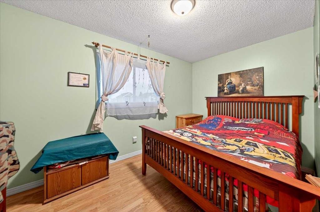 262 Martindale Boulevard Ne, Calgary, AB - Indoor Photo Showing Bedroom
