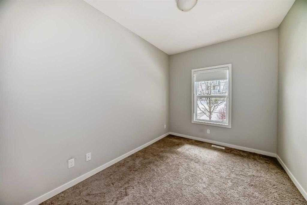 401-250 Fireside View, Cochrane, AB - Indoor Photo Showing Other Room