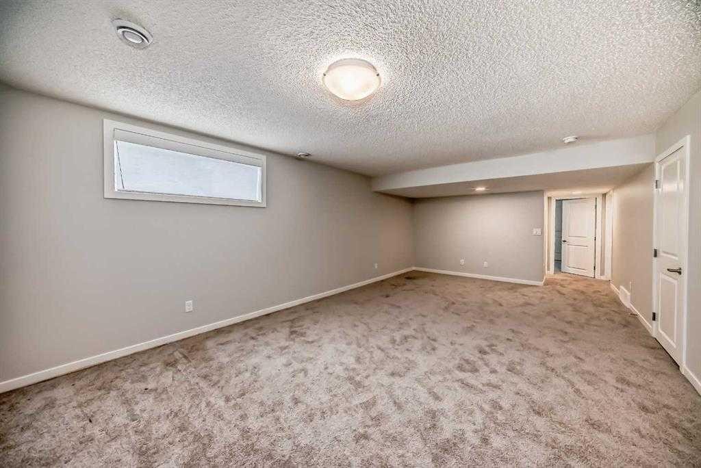401-250 Fireside View, Cochrane, AB - Indoor Photo Showing Other Room