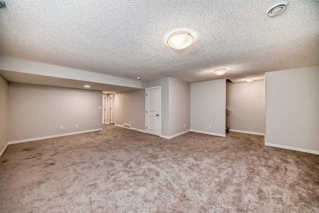 401-250 Fireside View, Cochrane, AB - Indoor Photo Showing Other Room