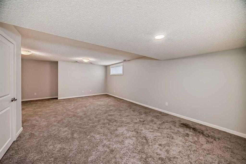 401-250 Fireside View, Cochrane, AB - Indoor Photo Showing Other Room